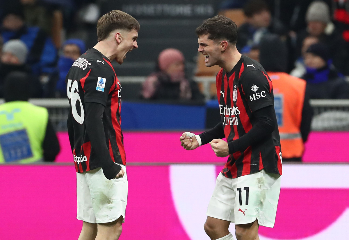 MILAN, ITALY - NOVEMBER 23: Christian Pulisic of AC Milan celebrates with his team-mate Alexis Saelemaekers after scoring their team's first goalduring the Serie A match between FC Internazionale and AC Milan at Giuseppe Meazza Stadium on November 23, 2025 in Milan, Italy. (Photo by Marco Luzzani/Getty Images)