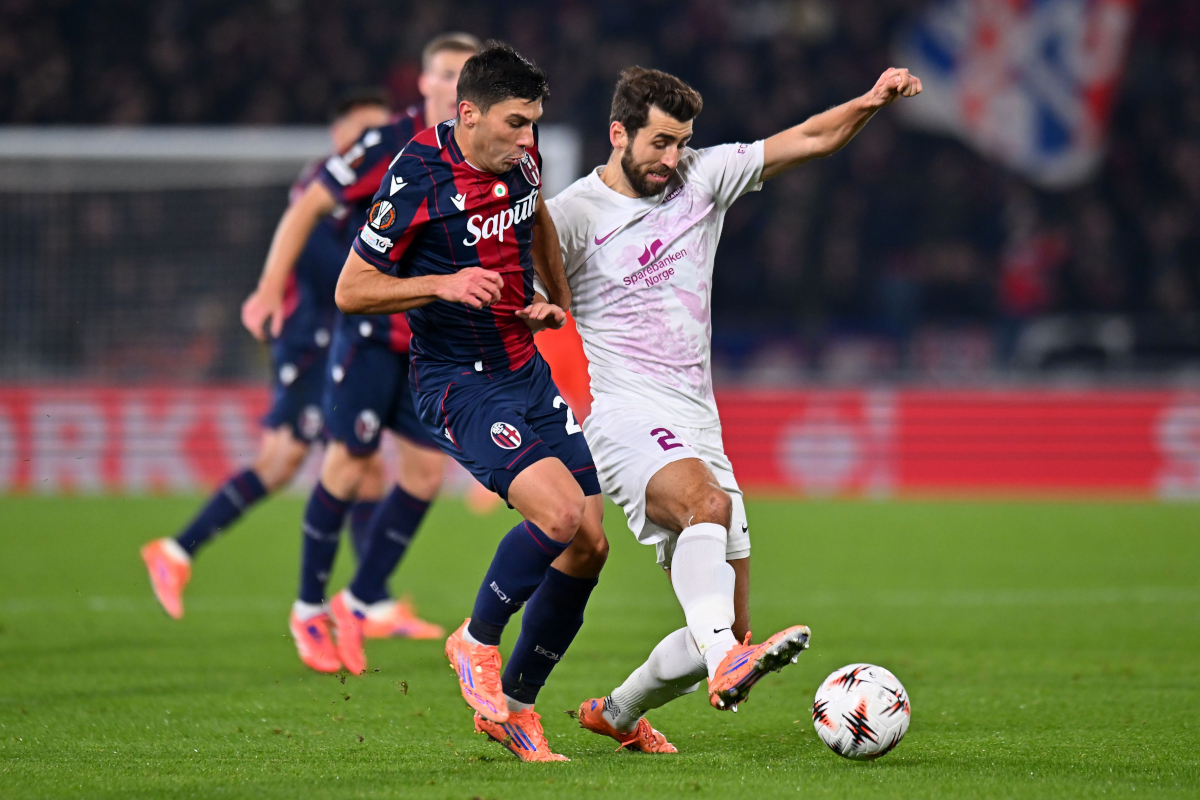 BOLOGNA, ITALY - NOVEMBER 06: Nicolo Cambiaghi of Bologna FC fights for the ball with Vetre Dragnes of Sport Cluven Bran during the match between Bologna FC 1909 and SK Bran during the UEFA Europa League 2025/26 League Phase MD4 at Stadio Renato Dall'Ara on November 6, 2025 in Bologna, Italy. (Photo by Alessandro Sabatini/Getty Images)