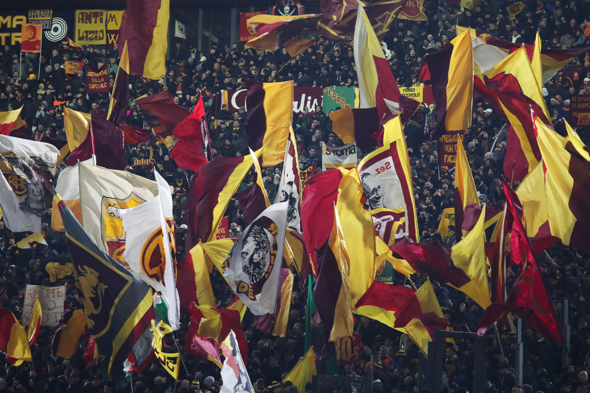 ROME, ITALY - NOVEMBER 30: Fans of AS Roma show thier support by displaying flags prior to the Serie A match between AS Roma and SSC Napoli at Stadio Olimpico on November 30, 2025 in Rome, Italy. (Photo by Paolo Bruno/Getty Images)