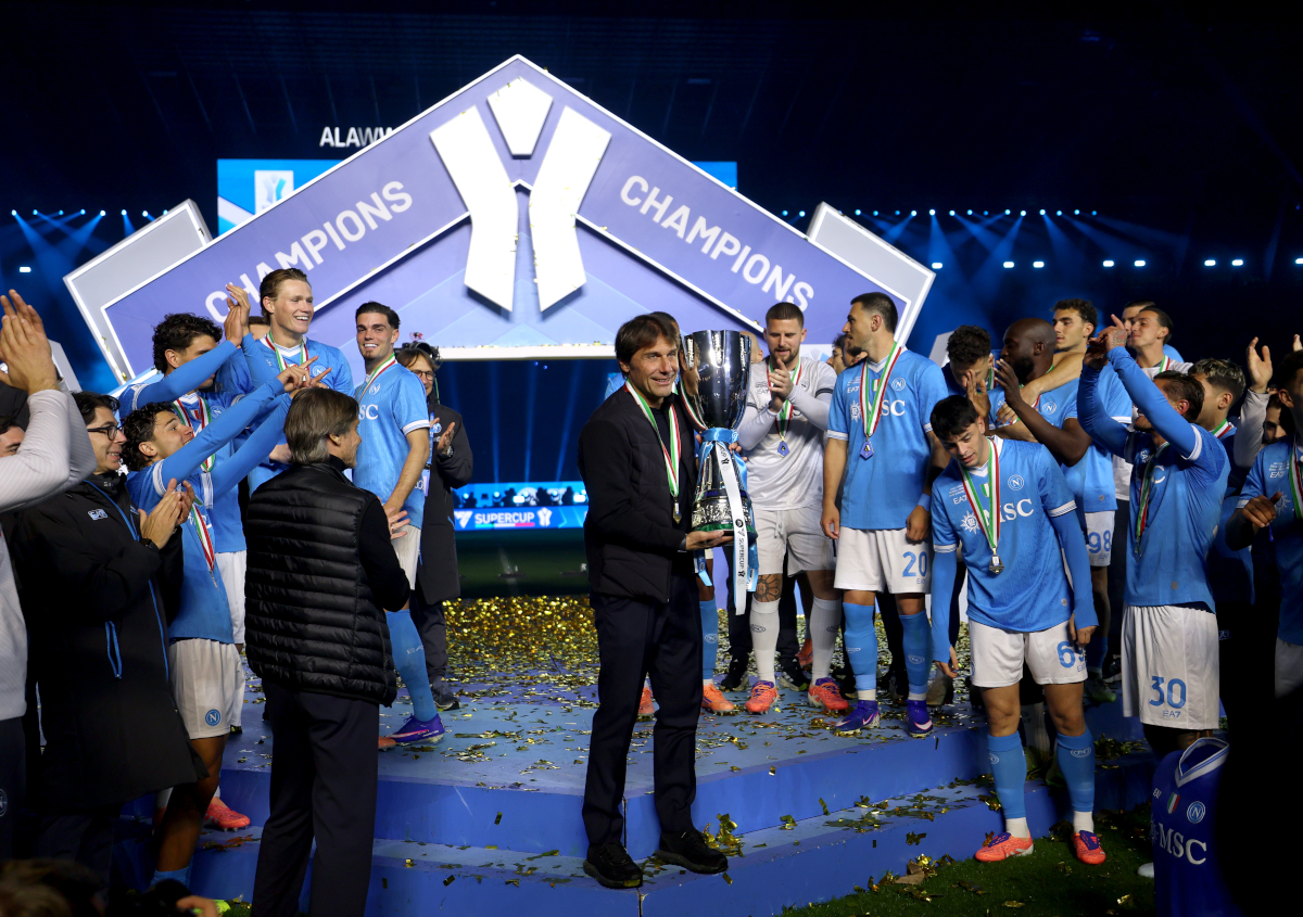 RIYADH, SAUDI ARABIA - DECEMBER 22: Antonio Conte, Head Coach of SSC Napoli, poses for a photo with the Supercoppa Italiana trophy after the team's victory in the Supercoppa Italiana Final between SSC Napoli and Bologna FC 1909 at King Saud University Stadium on December 22, 2025 in Riyadh, Saudi Arabia. (Photo by Yasser Bakhsh/Getty Images)