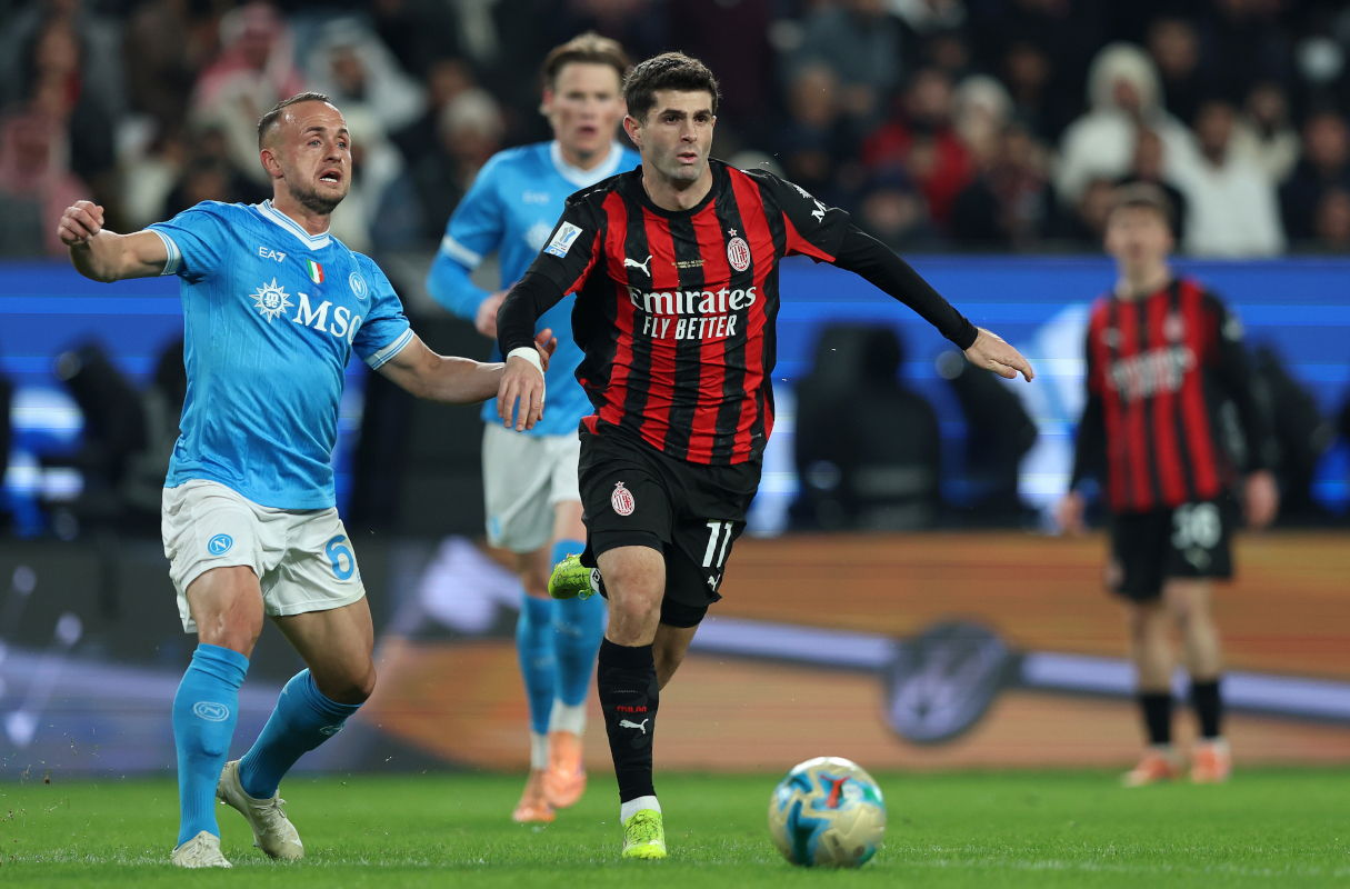RIYADH, SAUDI ARABIA - DECEMBER 18: Christian Pulisic of AC Milan battles for possession with Stanislav Lobotka of SSC Napoli during the Supercoppa Italiana Semi-Final match between SSC Napoli and AC Milan at King Saud University Stadium on December 18, 2025 in Riyadh, Saudi Arabia. (Photo by Yasser Bakhsh/Getty Images)