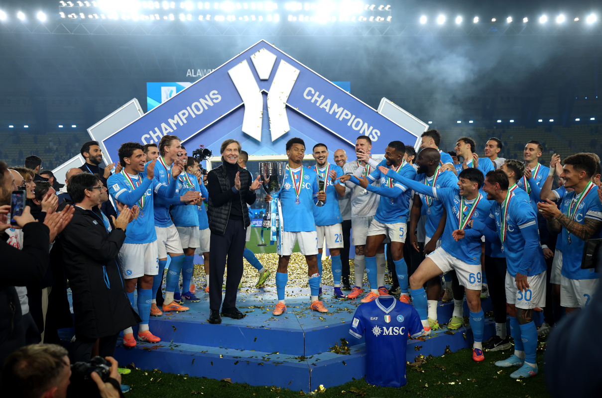 RIYADH, SAUDI ARABIA - DECEMBER 22: David Neres of SSC Napoli poses for a photo with the Supercoppa Italiana trophy and Player of the Match award after the team's victory in the Supercoppa Italiana Final between SSC Napoli and Bologna FC 1909 at King Saud University Stadium on December 22, 2025 in Riyadh, Saudi Arabia. (Photo by Yasser Bakhsh/Getty Images)