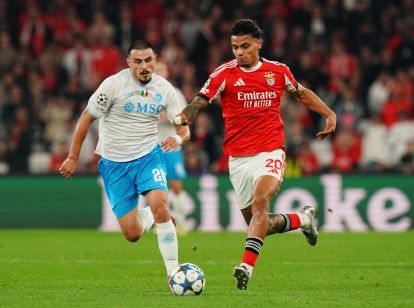 LISBON, PORTUGAL - DECEMBER 10: Richard Rios of Benfica runs with the ball under pressure from Eljif Elmas of SSC Napoli during the UEFA Champions League 2025/26 League Phase MD6 match between SL Benfica and SSC Napoli at on December 10, 2025 in Lisbon, Portugal. (Photo by Gualter Fatia/Getty Images)
