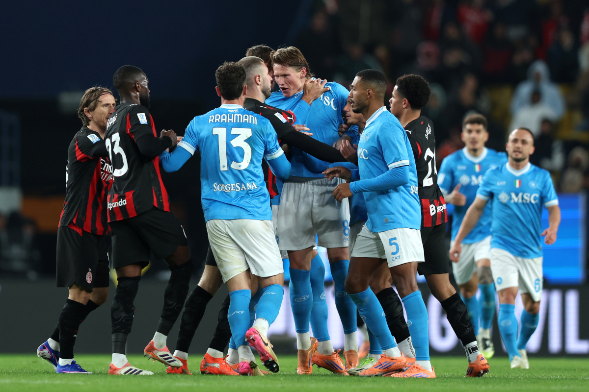 RIYADH, SAUDI ARABIA - DECEMBER 18: Scott McTominay of SSC Napoli clashes with Strahinja Pavlovic of AC Milan during the Supercoppa Italiana Semi-Final match between SSC Napoli and AC Milan at King Saud University Stadium on December 18, 2025 in Riyadh, Saudi Arabia. (Photo by Yasser Bakhsh/Getty Images)