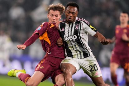 Roma defender Jan Ziolkowski challenges Juventus forward Lois Openda during their Serie A match