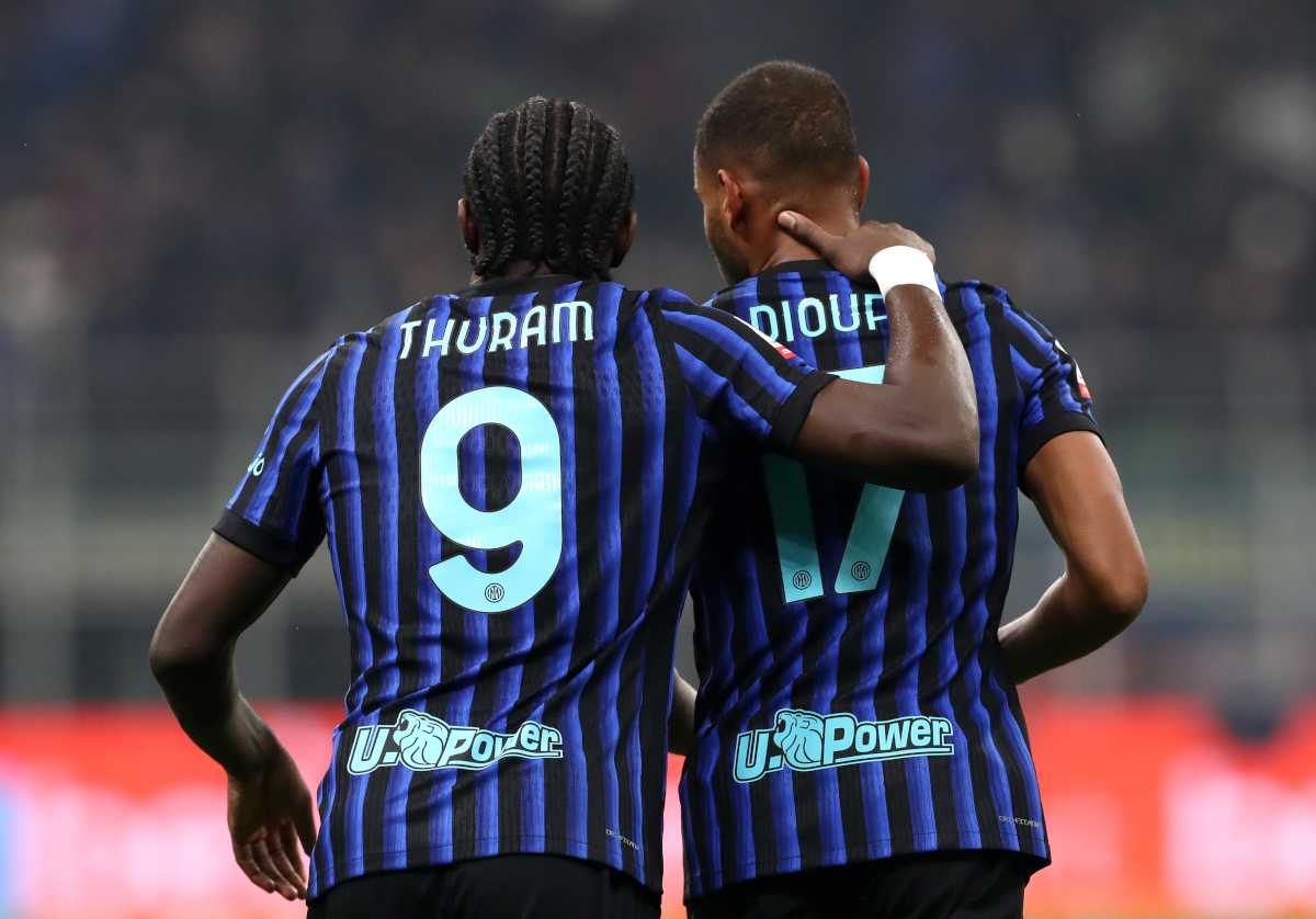 MILAN, ITALY - DECEMBER 03: Andy Diouf of FC Internazionale Milano celebrates scoring his team's first goal with teammate Marcus Thuram during the Coppa Italia round of 16 match between FC Internazionale and Venezia FC at San Siro Stadium on December 03, 2025 in Milan, Italy. (Photo by Marco Luzzani/Getty Images)