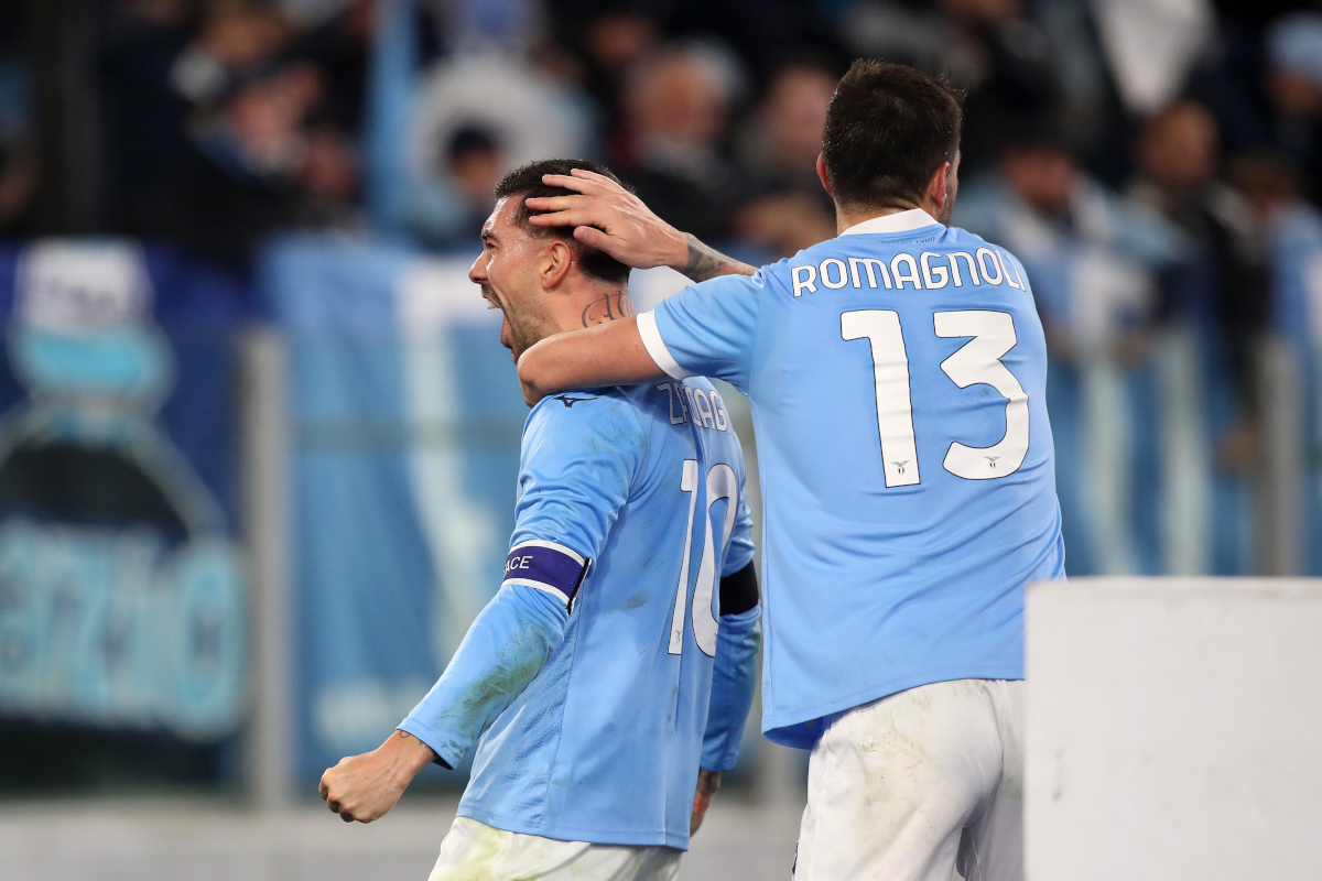 ROME, ITALY - DECEMBER 04: Mattia Zaccagni of Lazio celebrates scoring his team's first goal with teammate Alessio Romagnoli during the Coppa Italia Round of 16 match between SS Lazio and AC Milan at Olimpico Stadium on December 04, 2025 in Rome, Italy. (Photo by Paolo Bruno/Getty Images)