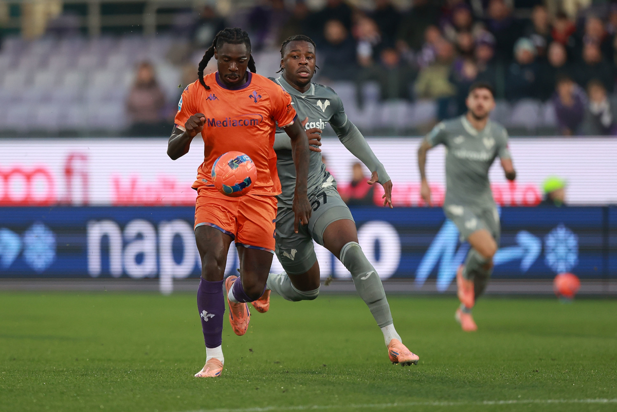 FLORENCE, ITALY - DECEMBER 14: Moise Kean of ACF Fiorentina battles for the ball with Arnel Bella-Kotchap of Hellas Verona during the Serie A match between ACF Fiorentina and Hellas Verona FC at Artemio Franchi on December 14, 2025 in Florence, Italy. (Photo by Gabriele Maltinti/Getty Images)