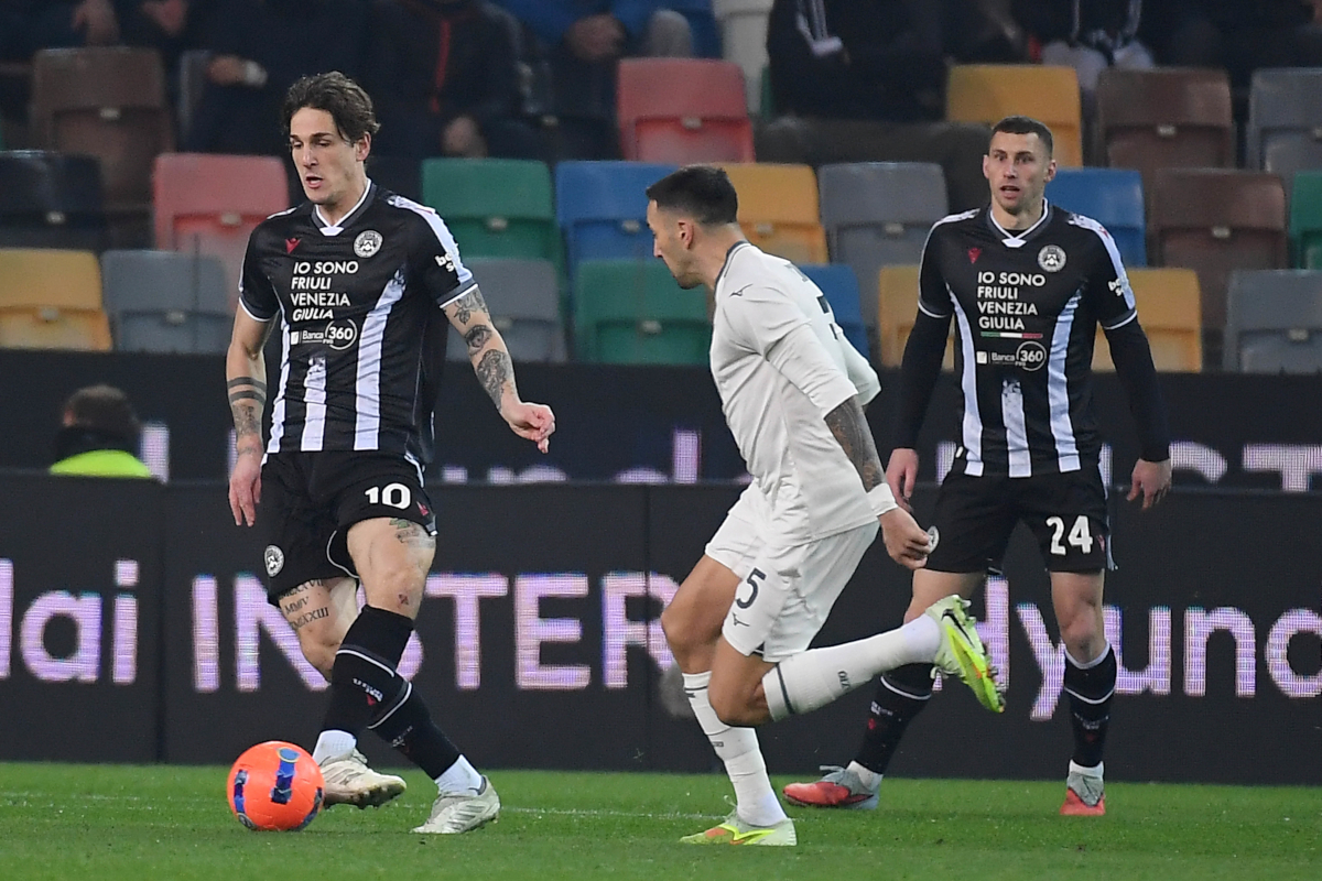 UDINE, ITALY - DECEMBER 27: Matias Vecino of SS Lazio compete for the ball with Nicolò Zaniolo of Udinese Calcio during the Serie A match between Udinese Calcio and SS Lazio at Stadio Friuli on December 27, 2025 in Udine, Italy. (Photo by Marco Rosi - SS Lazio/Getty Images)