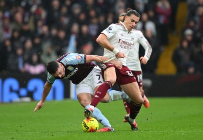 BIRMINGHAM, ENGLAND - DECEMBER 06: John McGinn of Aston Villa and Riccardo Calafiori of Arsenal battle for possession during the Premier League match between Aston Villa and Arsenal at Villa Park on December 06, 2025 in Birmingham, England. (Photo by Shaun Botterill/Getty Images)