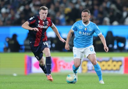 RIYADH, SAUDI ARABIA - DECEMBER 22: Stanislav Lobotka of SSC Napoli controls the ball whilst under pressure from Lewis Ferguson of Bologna during the Supercoppa Italiana Final between SSC Napoli and Bologna FC 1909 at King Saud University Stadium on December 22, 2025 in Riyadh, Saudi Arabia. (Photo by Abdullah Ahmed/Getty Images)