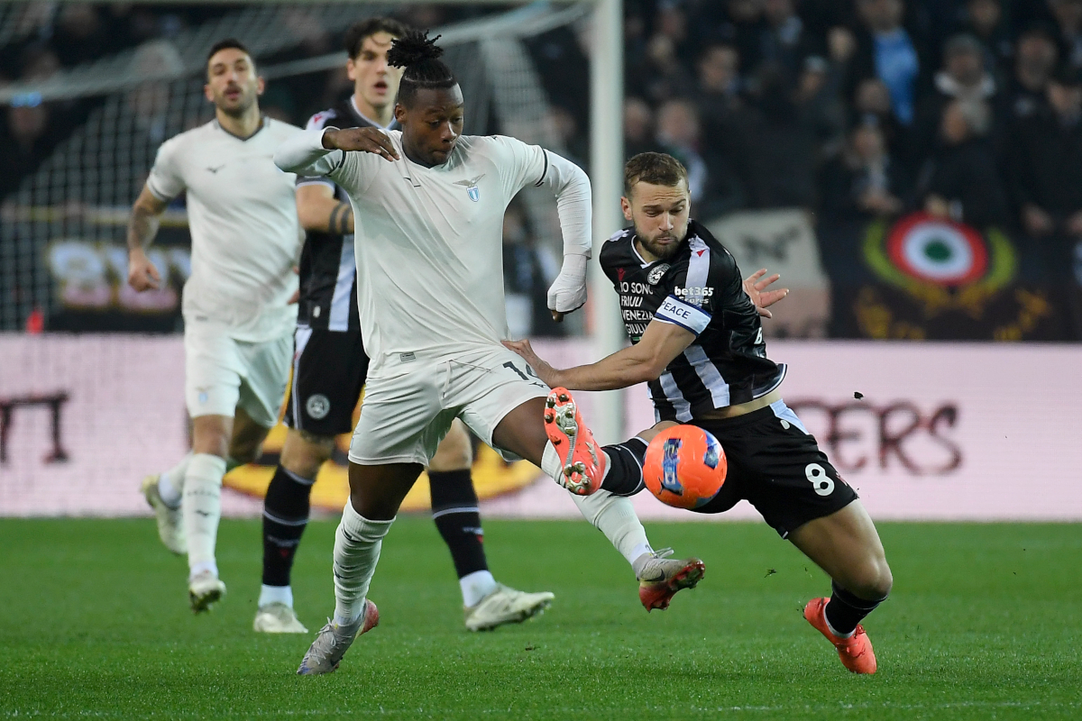 UDINE, ITALY - DECEMBER 27: Tijjani Noslin of SS Lazio compete for the ball with Jesper Karlstrom of Udinese Calcio during the Serie A match between Udinese Calcio and SS Lazio at Stadio Friuli on December 27, 2025 in Udine, Italy. (Photo by Marco Rosi - SS Lazio/Getty Images)
