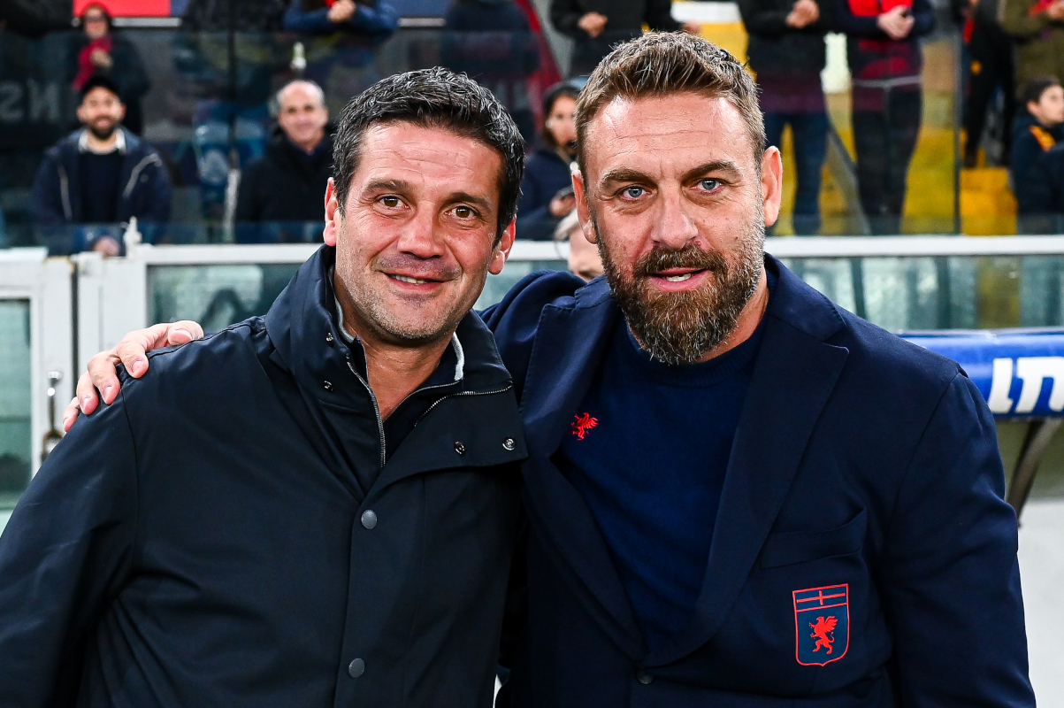 GENOA, ITALY - DECEMBER 14: Daniele De Rossi, head coach of Genoa (R), greets Cristian Chivu, head coach of Inter, prior to kick-off in the Serie A match between Genoa CFC and FC Internazionale at Luigi Ferraris Stadium on December 14, 2025 in Genoa, Italy. (Photo by Simone Arveda/Getty Images)