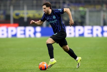MILAN, ITALY - JANUARY 14: Carlos Augusto of FC Internazionale Milano runs with the ball during the Serie A match between FC Internazionale and US Lecce at Giuseppe Meazza Stadium on January 14, 2026 in Milan, Italy. (Photo by Marco Luzzani/Getty Images)