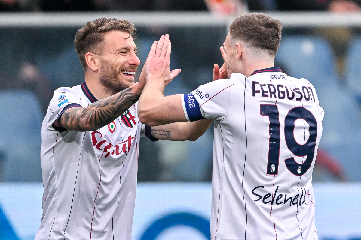 GENOA, ITALY - JANUARY 25: Ciro Immobile (L) and Lewis Ferguson of Bologna celebrate after Sebastian Otoa of Genoa's own-goal during the Serie A match between Genoa CFC and Bologna FC 1909 at Luigi Ferraris Stadium on January 25, 2026 in Genoa, Italy. (Photo by Getty Images)