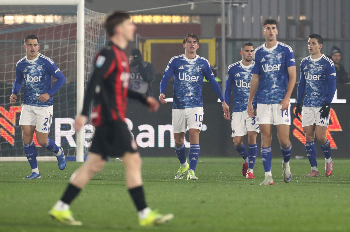 COMO, ITALY - JANUARY 15: Marc Olivier Kenpf (L) of Como 1907 celebrates after scoring their team's first goal during the Serie A match between Como 1907 and AC Milan at Giuseppe Sinigaglia Stadium on January 15, 2026 in Como, Italy. (Photo by Marco Luzzani/Getty Images)