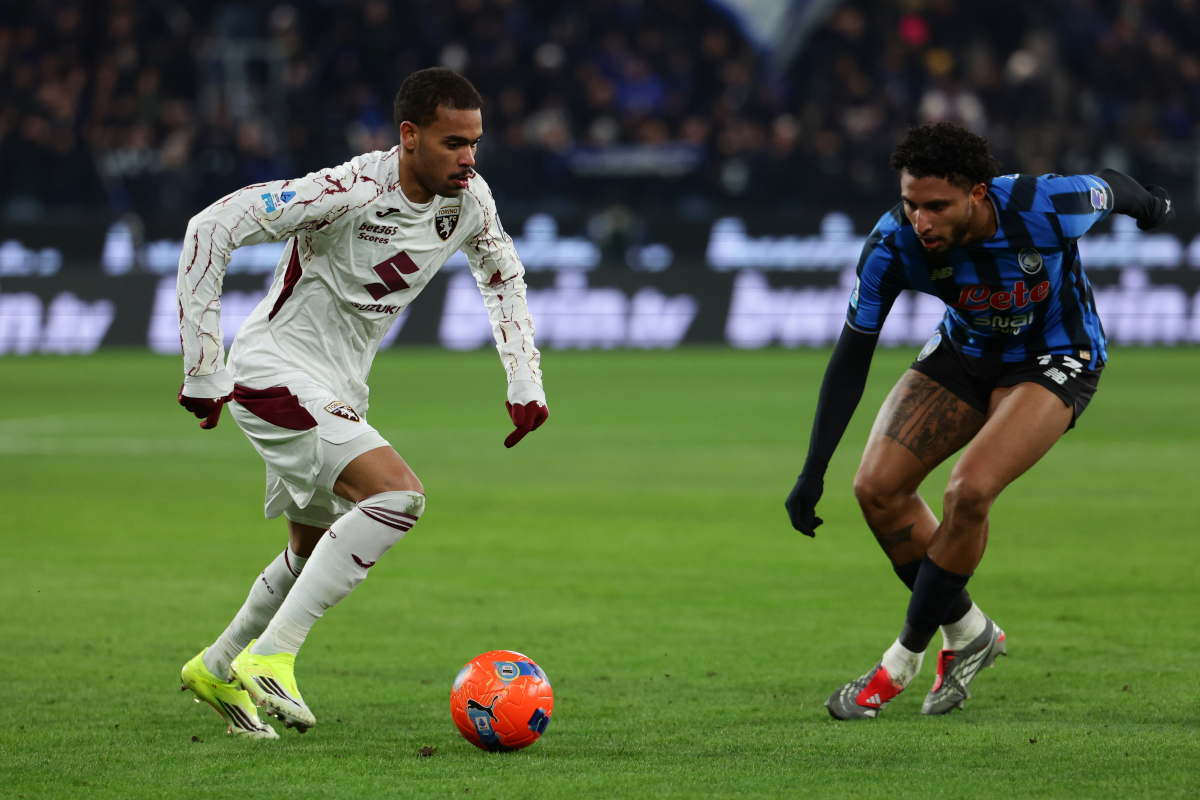 BERGAMO, ITALY - JANUARY 10: Cyril Ngonge of Torino FC is challenged by Ederson of Atalanta BC during the Serie A match between Atalanta BC and Torino FC at Gewiss Stadium on January 10, 2026 in Bergamo, Italy. (Photo by Francesco Scaccianoce/Getty Images)