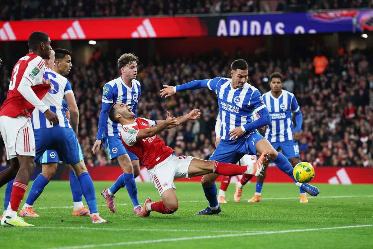 LONDON, ENGLAND - OCTOBER 29: Mikel Merino of Arsenal reacts whilst under pressure from Diego Coppola of Brighton & Hove Albion during the Carabao Cup Fourth Round match between Arsenal and Brighton & Hove Albion at Emirates Stadium on October 29, 2025 in London, England. (Photo by Eddie Keogh/Getty Images)