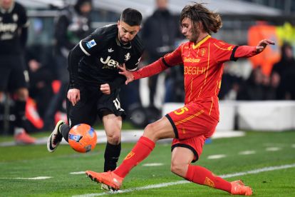 TURIN, ITALY - JANUARY 03: Edon Zhegrova of Juventus is challenged by Antonino Gallo of US Lecce during the Serie A match between Juventus FC and US Lecce at on January 03, 2026 in Turin, Italy. (Photo by Valerio Pennicino/Getty Images)