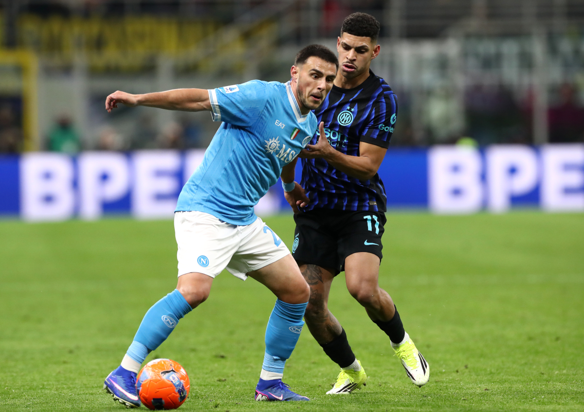 MILAN, ITALY - JANUARY 11: Eljif Elmas of SSC Napoli is challenged by Luis Henrique of FC Internazionale Milano during the Serie A match between FC Internazionale and SSC Napoli at Giuseppe Meazza Stadium on January 11, 2026 in Milan, Italy. (Photo by Marco Luzzani/Getty Images)