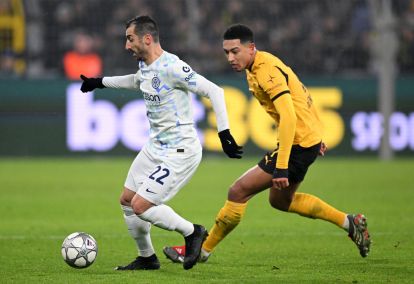 DORTMUND, GERMANY - JANUARY 28: Henrikh Mkhitaryan of FC Internazionale Milano runs with the ball whilst under pressure from Jobe Bellingham of Borussia Dortmund during the UEFA Champions League 2025/26 League Phase MD8 match between Borussia Dortmund and FC Internazionale Milano at BVB Stadion Dortmund on January 28, 2026 in Dortmund, Germany. (Photo by Stuart Franklin/Getty Images)