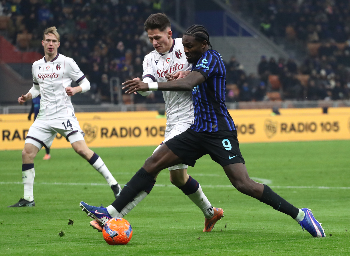 MILAN, ITALY - JANUARY 04: Marcus Thuram of FC Internazionale Milano is challenged by Martin Vitik of Bologna during the Serie A match between FC Internazionale and Bologna FC 1909 at Giuseppe Meazza Stadium on January 04, 2026 in Milan, Italy. (Photo by Marco Luzzani/Getty Images)