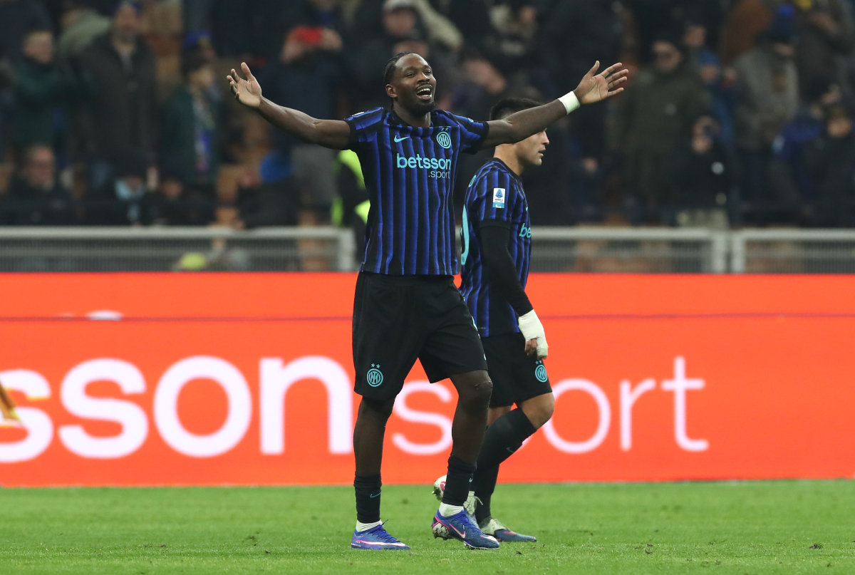 MILAN, ITALY - JANUARY 04: Marcus Thuram of FC Internazionale Milano celebrates scoring his team's third goal during the Serie A match between FC Internazionale and Bologna FC 1909 at Giuseppe Meazza Stadium on January 04, 2026 in Milan, Italy. (Photo by Marco Luzzani/Getty Images)