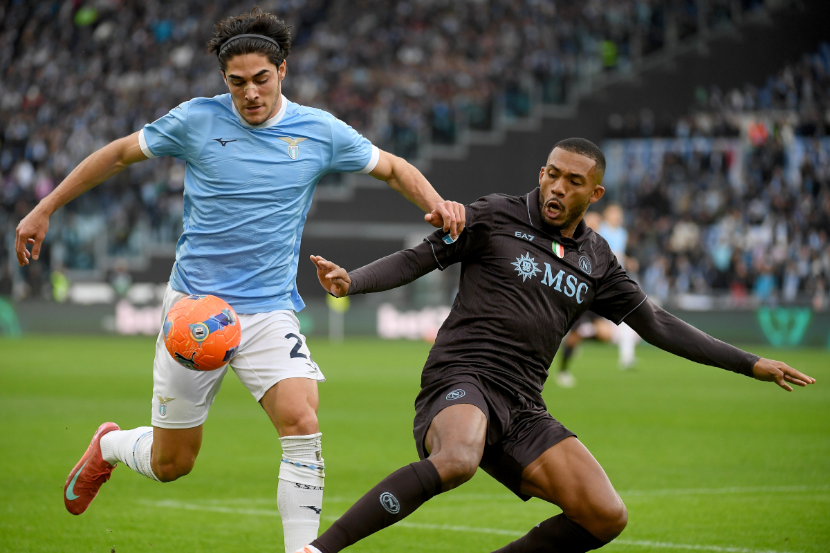 ROME, ITALY - JANUARY 04: Matteo Cancellieri of SS Lazio competes for the ball with Juan Jesus of SSC Napoli during the Serie A match between SS Lazio and SSC Napoli at Stadio Olimpico on January 04, 2026 in Rome, Italy. (Photo by Marco Rosi - SS Lazio/Getty Images)