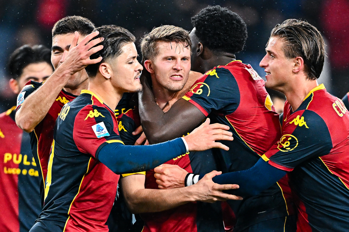 GENOA, ITALY - JANUARY 12: Morten Frendrup of Genoa (center) celebrates with his team-mates after scoring a goal during the Serie A match between Genoa CFC and Cagliari Calcio at Stadio Luigi Ferraris on January 12, 2026 in Genoa, Italy. (Photo by Simone Arveda/Getty Images)