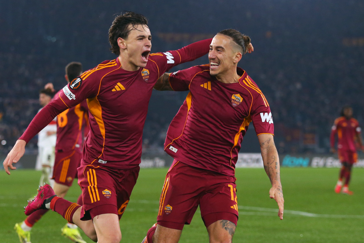 ROME, ITALY - JANUARY 22: Niccolo Pisilli of AS Roma celebrates with his teammate Kostas Tsimikas after scoring the opening goal during the UEFA Europa League 2025/26 League Phase MD7 match between AS Roma and VfB Stuttgart at Stadio Olimpico on January 22, 2026 in Rome, Italy. (Photo by Paolo Bruno/Getty Images)