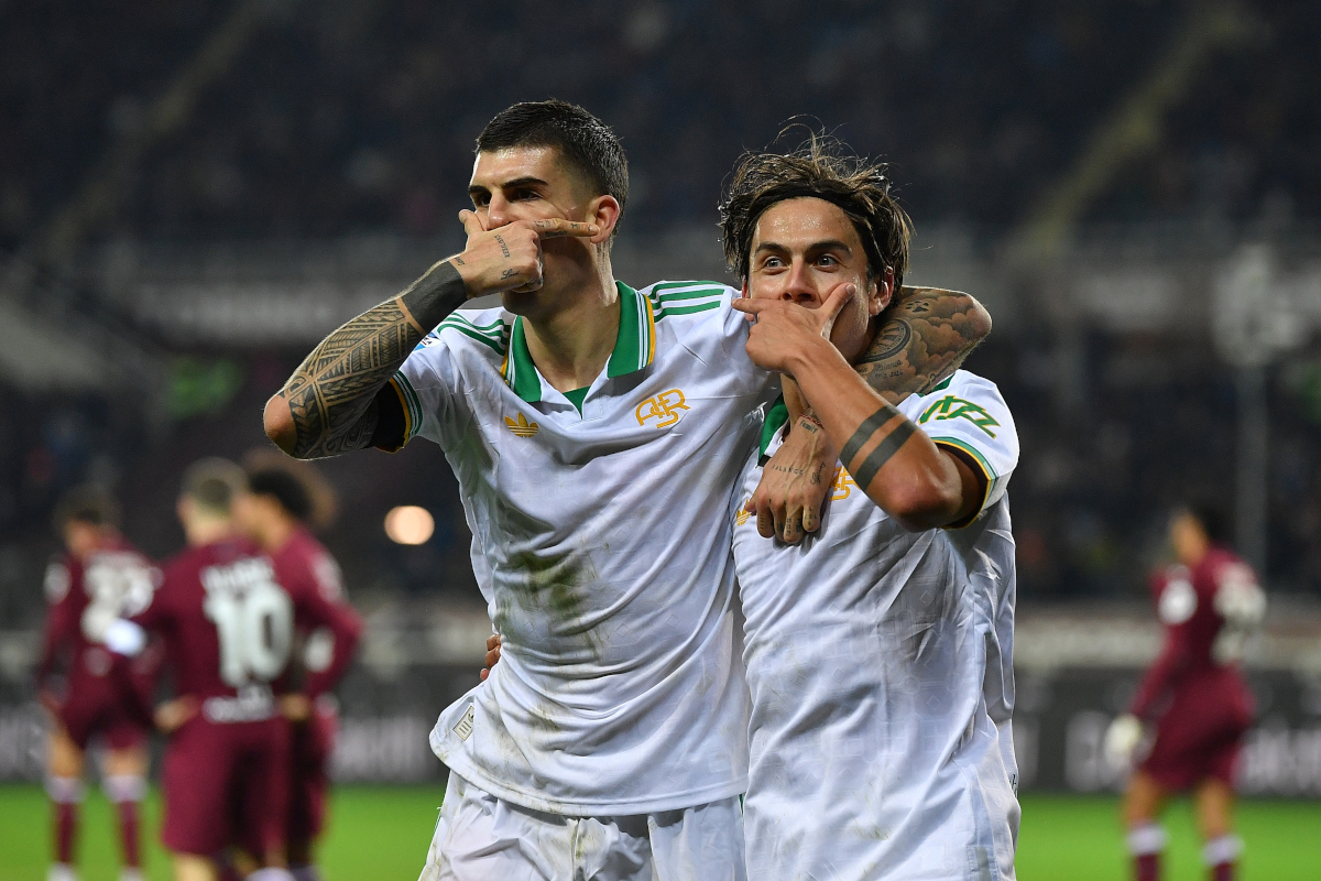 TURIN, ITALY - JANUARY 18: Paulo Dybala of AS Roma celebrates a goal with team mate Gianluca Mancini during the Serie A match between Torino FC and AS Roma at Stadio Olimpico di Torino on January 18, 2026 in Turin, Italy. (Photo by Valerio Pennicino/Getty Images)