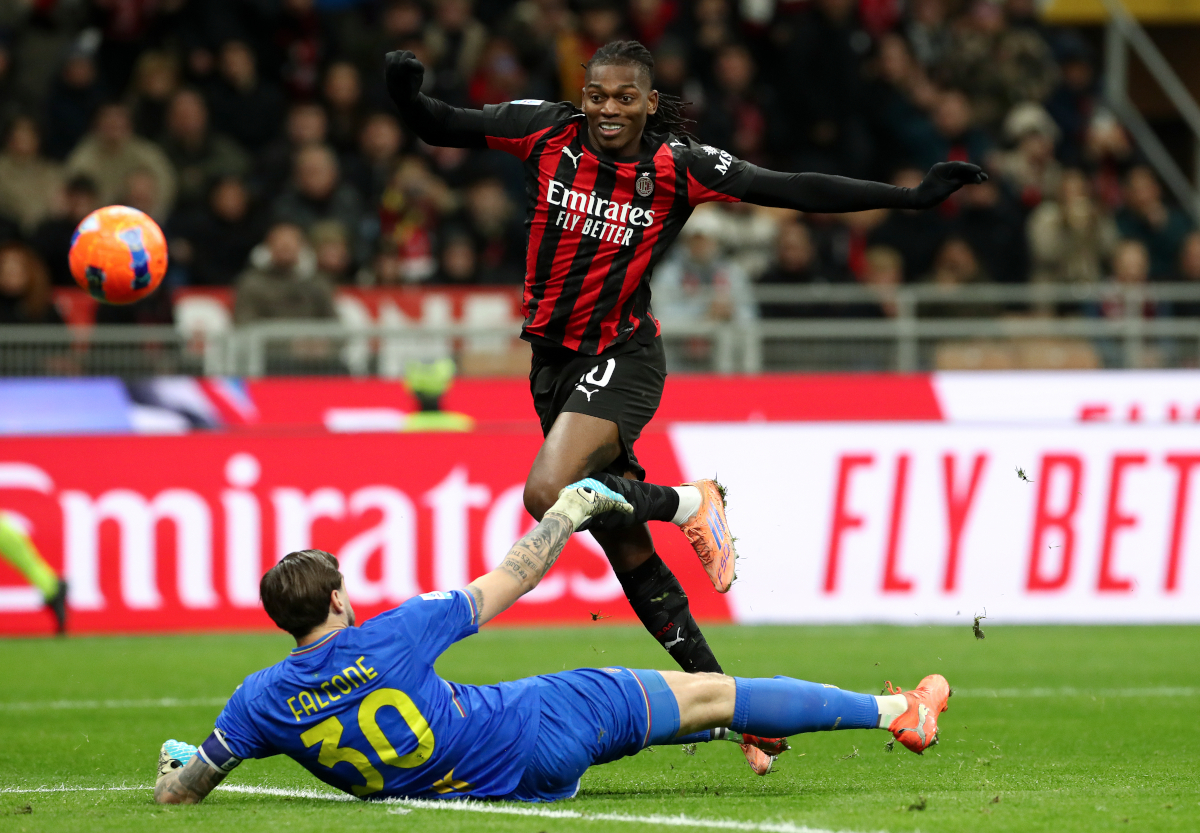 MILAN, ITALY - JANUARY 18: Rafael Leao of AC Milan shoots as Wladimiro Falcone of US Lecce attempts to make a save during the Serie A match between AC Milan and US Lecce at Giuseppe Meazza Stadium on January 18, 2026 in Milan, Italy. (Photo by Marco Luzzani/Getty Images)