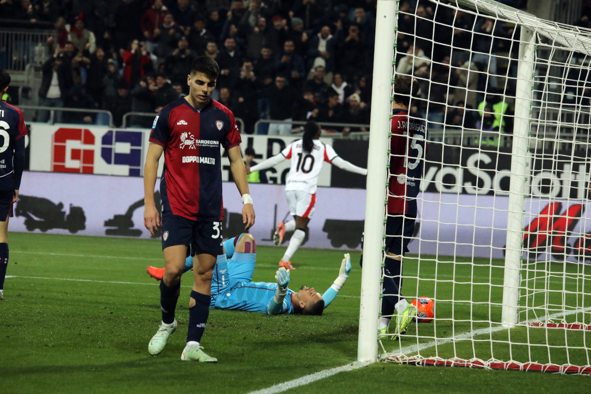CAGLIARI, ITALY - JANUARY 02: Adam Obert of Cagliari reacts as Rafael Leao of Milan scores a goal, bringing the score to 0-1 during the Serie A match between Cagliari Calcio and AC Milan at Stadio Sant'Elia on January 02, 2026 in Cagliari, Italy. (Photo by Enrico Locci/Getty Images)