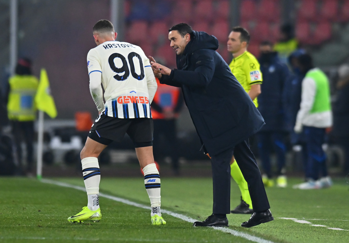 BOLOGNA, ITALY - JANUARY 07: Nikola Krstovic of Atalanta celebrates scoring his team's first goal with Raffaele Palladino, Head Coach of Atalanta, during the Serie A match between Bologna FC 1909 and Atalanta BC at Renato Dall'Ara Stadium on January 07, 2026 in Bologna, Italy. (Photo by Alessandro Sabattini/Getty Images)