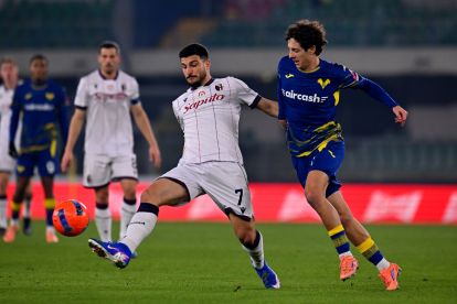 VERONA, ITALY - JANUARY 15: Riccardo Orsolini of Bologna FC competes for the ball with Domagoj Bradarić of Hellas Verona during the Serie A match between Hellas Verona FC and Bologna FC 1909 at Stadio Marcantonio Bentegodi on January 15, 2026 in Verona, Italy. (Photo by Alessandro Sabattini/Getty Images)