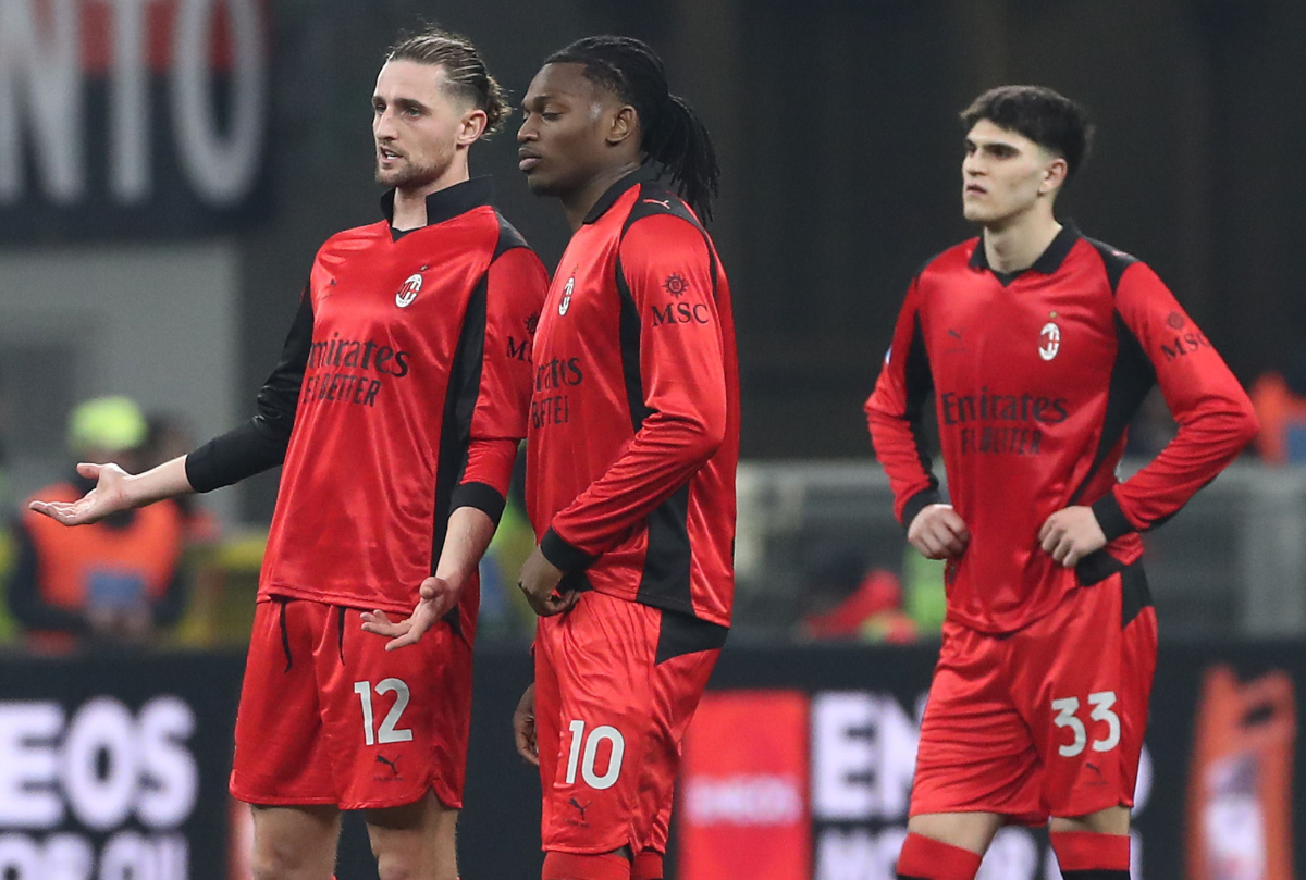 MILAN, ITALY - FEBRUARY 22: Adrien Rabiot, Rafael Leao and Davide Bartesaghi of AC Milan show their dejection during the Serie A match between AC Milan and Parma Calcio 1913 at Giuseppe Meazza Stadium on February 22, 2026 in Milan, Italy. (Photo by Marco Luzzani/Getty Images)