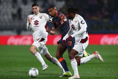 MONZA, ITALY - FEBRUARY 04: Andy Diouf of FC Internazionale Milano battles for possession with Matteo Prati and Adrien Tameze of Torino during the Coppa Italia Quarter-Final match between FC Internazionale and Torino at U-Power Stadium on February 04, 2026 in Monza, Italy. (Photo by Marco Luzzani/Getty Images)