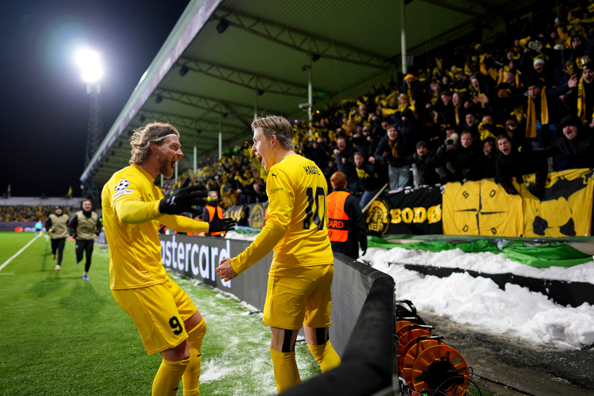 BODO, NORWAY - FEBRUARY 18: Jens Petter Hauge of Bodo/Glimt celebrates scoring his team's second goal with teammate Kasper Hogh during the UEFA Champions League 2025/26 League Knockout Play-off First Leg match between FK Bodo/Glimt and FC Internazionale Milano at Aspmyra Stadion on February 18, 2026 in Bodo, Norway. (Photo by Martin Ole Wold/Getty Images)