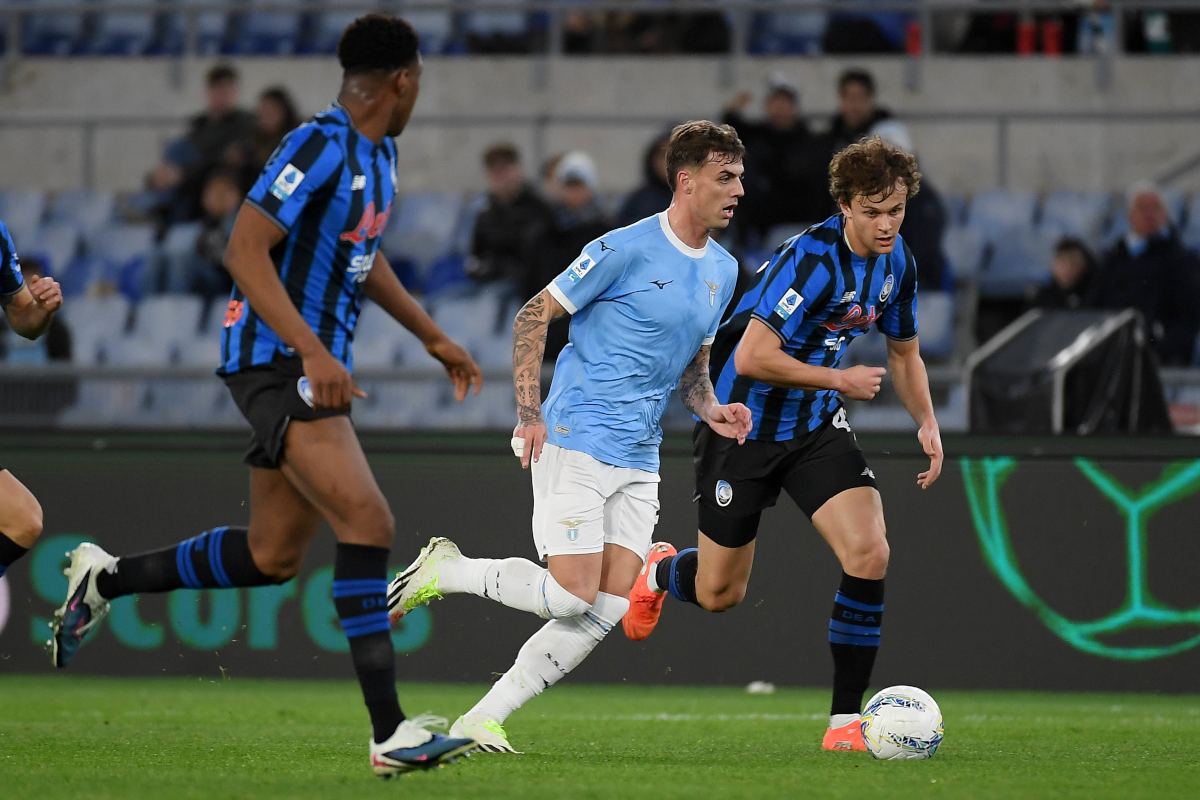ROME, ITALY - FEBRUARY 14: Daniel Maldini of SS Lazio competes for the ball with Giorgio Scalvini of Atalanta BC during the Serie A match between SS Lazio and Atalanta BC at Stadio Olimpico on February 14, 2026 in Rome, Italy. (Photo by Marco Rosi - SS Lazio/Getty Images)
