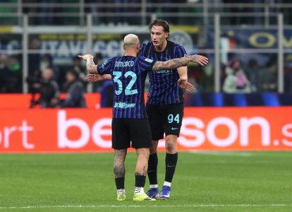 MILAN, ITALY - FEBRUARY 14: Francesco Pio Esposito of FC Internazionale Milano celebrates scoring his team's third goal with teammate Federico Dimarco during the Serie A match between FC Internazionale and Juventus FC at Giuseppe Meazza Stadium on February 14, 2026 in Milan, Italy. (Photo by Marco Luzzani/Getty Images)