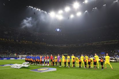 MILAN, ITALY - FEBRUARY 24: Match officials players and mascots line up on the pitch prior to the UEFA Champions League 2025/26 League Knockout Play-off Second Leg match between FC Internazionale Milano and FK Bodo/Glimt at Stadio San Siro on February 24, 2026 in Milan, Italy. (Photo by Marco Luzzani/Getty Images)