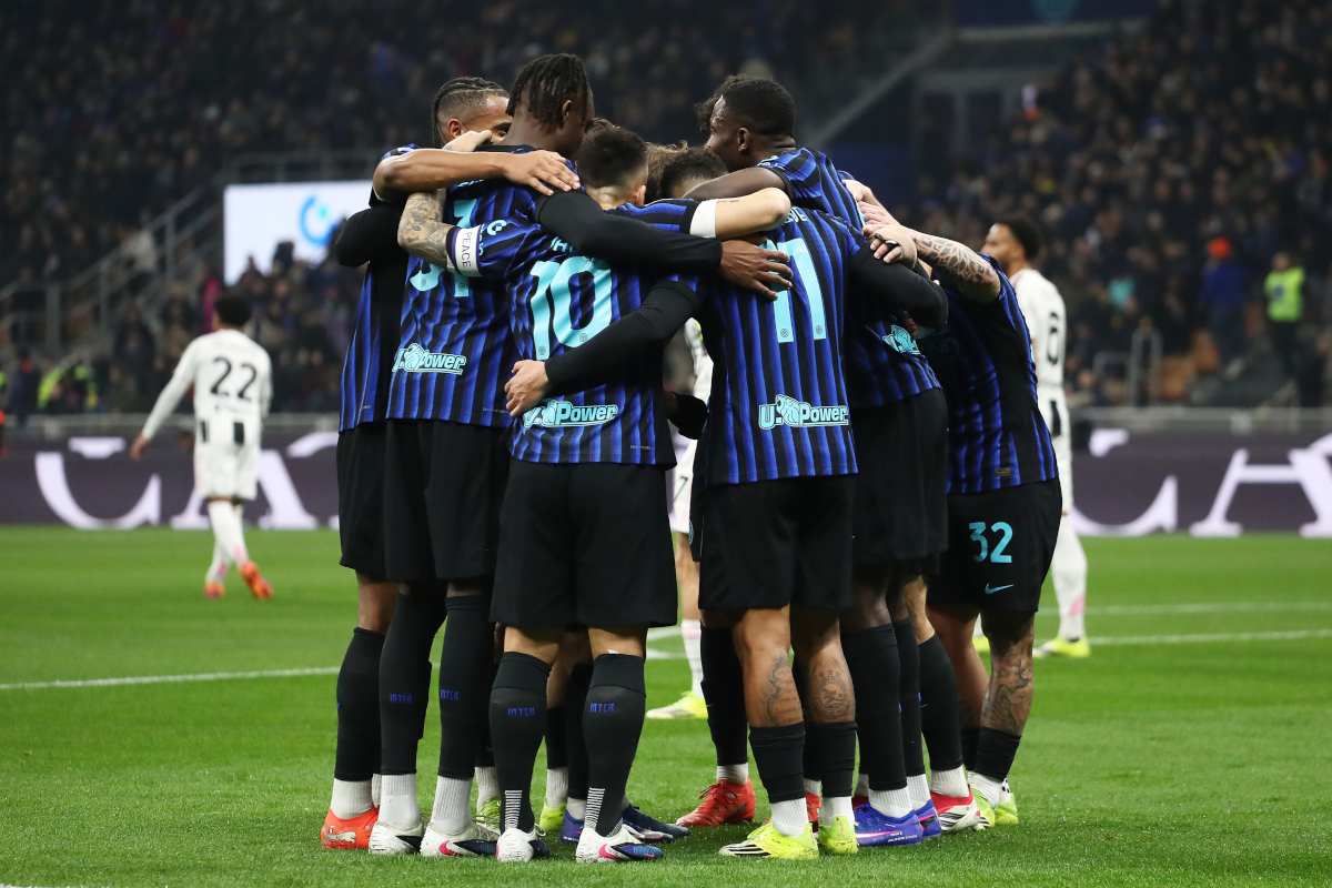 MILAN, ITALY - FEBRUARY 14: FC Internazionale Milano players celebrate their team's first goal which was an own goal scored by Andrea Cambiaso of Juventus (not pictured) during the Serie A match between FC Internazionale and Juventus FC at Giuseppe Meazza Stadium on February 14, 2026 in Milan, Italy. (Photo by Marco Luzzani/Getty Images)