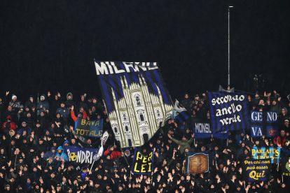 MONZA, ITALY - FEBRUARY 04: Fans of FC Internazionale Milano display banners and flags in the stands prior to the Coppa Italia Quarter-Final match between FC Internazionale and Torino at U-Power Stadium on February 04, 2026 in Monza, Italy. (Photo by Marco Luzzani/Getty Images)