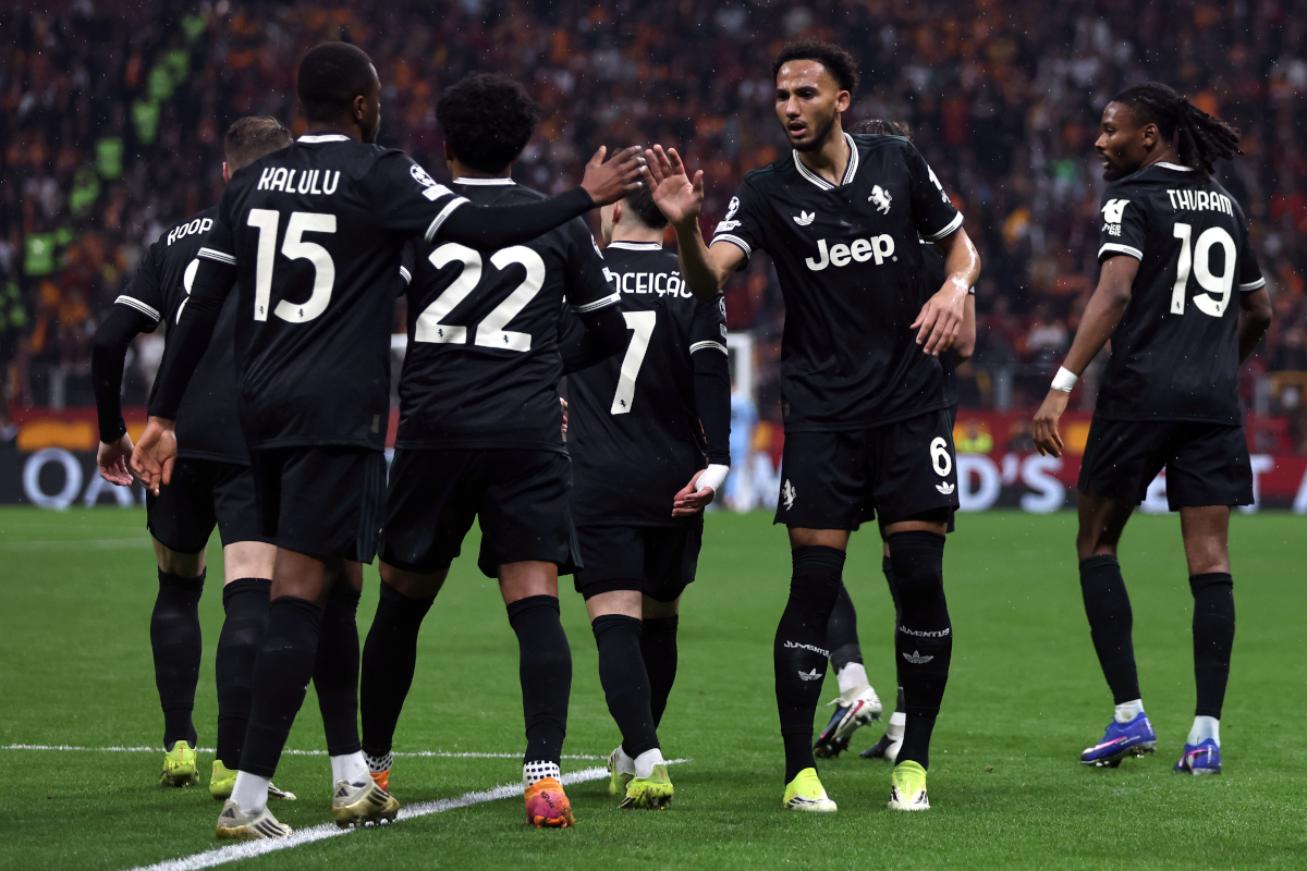 ISTANBUL, TURKEY - FEBRUARY 17: Lloyd Kelly and Pierre Kalulu celebrate after Teun Koopmeiners of Juventus (obscured) scored their sides first goal during the UEFA Champions League 2025/26 League Knockout Play-off First Leg match between Galatasaray A.S. and Juventus at Ali Sami Yen Spor Kompleksi on February 17, 2026 in Istanbul, Turkey. (Photo by Burak Kara/Getty Images)