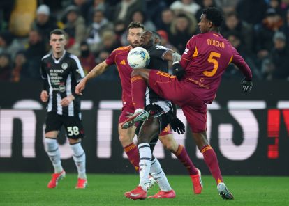 UDINE, ITALY - FEBRUARY 02: Evan Ndicka of Roma clashes with Keinan Davis of Udinese during the Serie A match between Udinese Calcio and AS Roma at Stadio Friuli on February 02, 2026 in Udine, Italy. (Photo by Timothy Rogers/Getty Images)