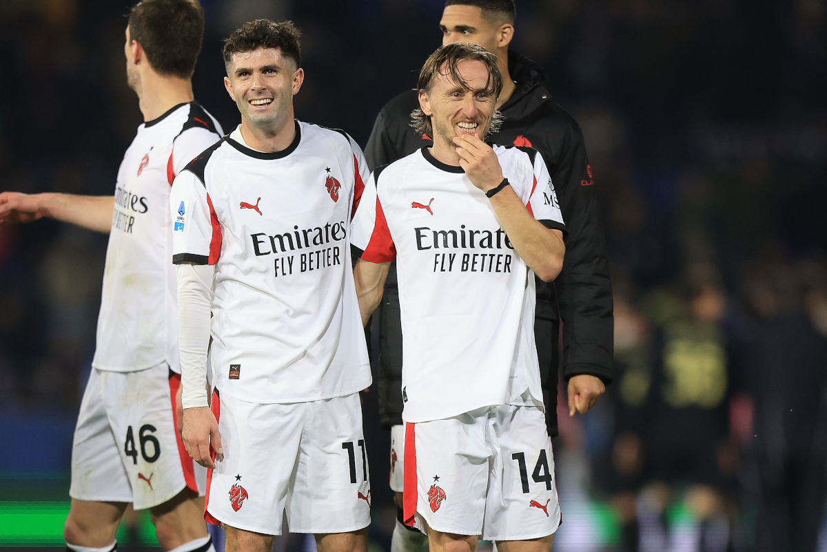 PISA, ITALY - FEBRUARY 13: Christian Pulisic and Luka Modric of AC Milan celebrates the victory after during the Serie A match between Pisa SC and AC Milan at Arena Garibaldi on February 13, 2026 in Pisa, Italy. (Photo by Gabriele Maltinti/Getty Images)