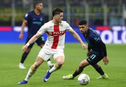 MILAN, ITALY - FEBRUARY 28: Vitinha of Genoa CFC is pressured by Luis Henriqueof FC Internazionale during the Serie A match between FC Internazionale and Genoa CFC at Giuseppe Meazza Stadium on February 28, 2026 in Milan, Italy. (Photo by Marco Luzzani/Getty Images)