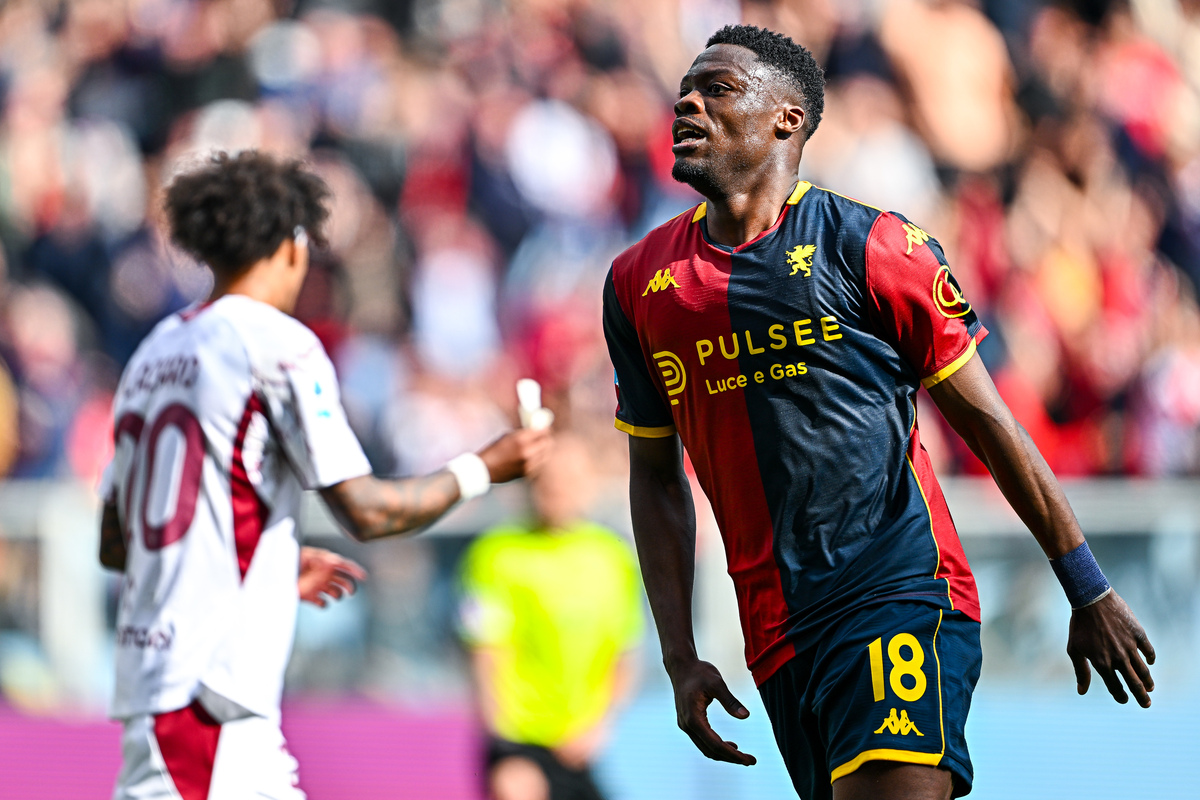 GENOA, ITALY - FEBRUARY 22: Caleb Ekuban of Genoa (right) celebrates after scoring a goal during the Serie A match between Genoa CFC and Torino FC at Stadio Luigi Ferraris on February 22, 2026 in Genoa, Italy. (Photo by Simone Arveda/Getty Images)