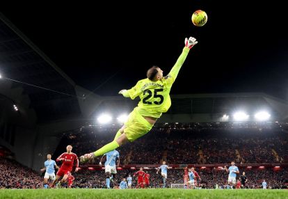 LIVERPOOL, ENGLAND - FEBRUARY 08: Manchester City's Gianluigi Donnarumma saves from Liverpool's Alexis Mac Allister during the Premier League match between Liverpool and Manchester City at Anfield on February 08, 2026 in Liverpool, England. (Photo by Carl Recine/Getty Images)