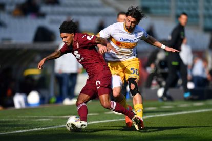 TURIN, ITALY - FEBRUARY 01: Valentino Lazaro of Torino is put under pressure by Santiago Pierotti of US Lecce during the Serie A match between Torino FC and US Lecce at Stadio Olimpico di Torino on February 01, 2026 in Turin, Italy. (Photo by Valerio Pennicino/Getty Images)